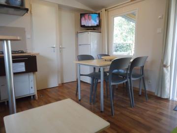 Alquiler de casa móvil Camping Grissotières comedor