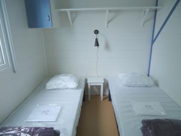 Mietmobilheim Camping Grissotières Schlafzimmer 2 zwei Betten 80/190